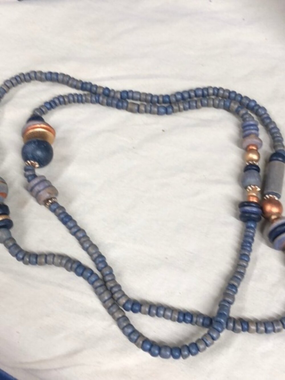 Blue and bronze wooden bead necklace